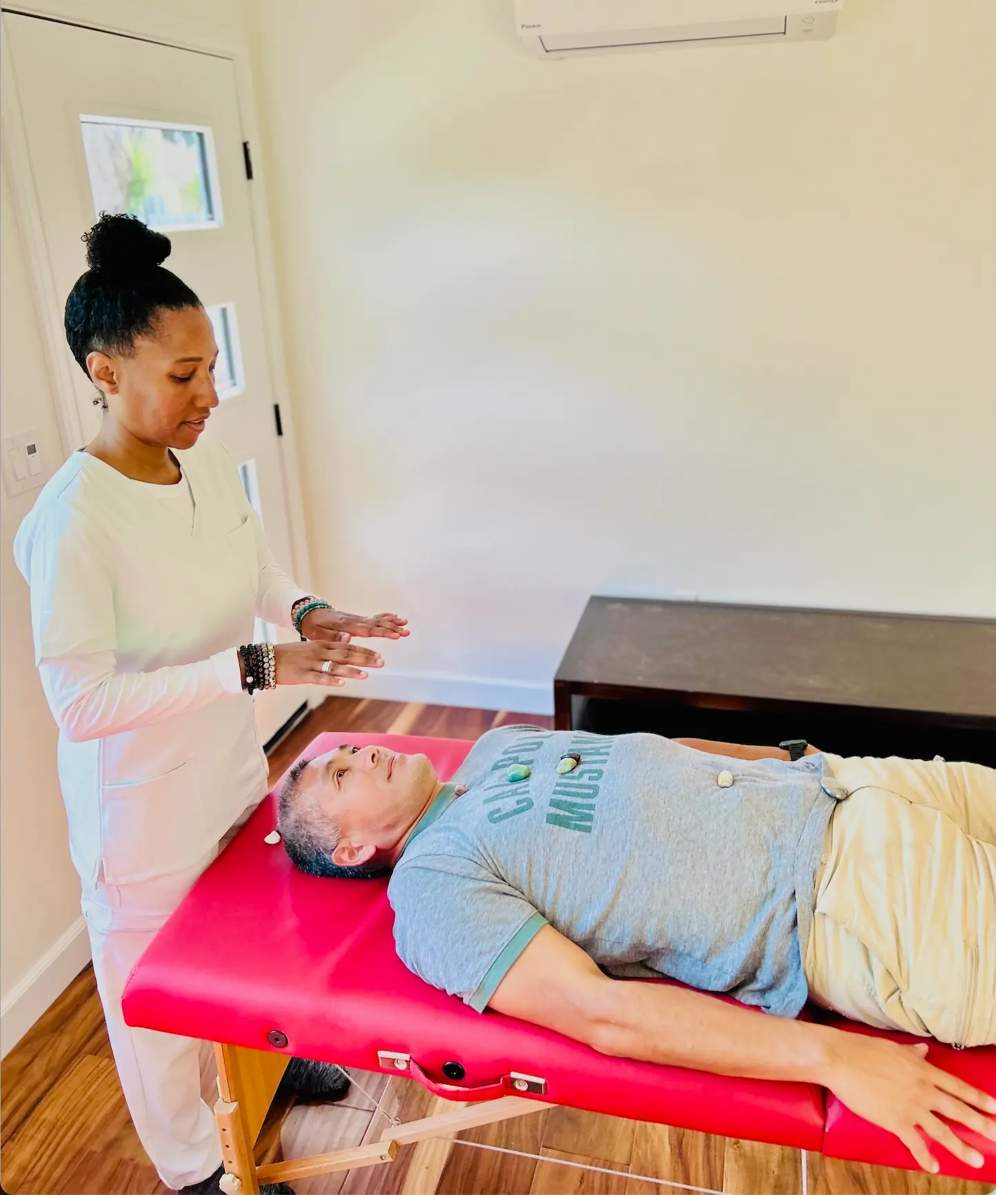 Adolpha giving a Reiki session